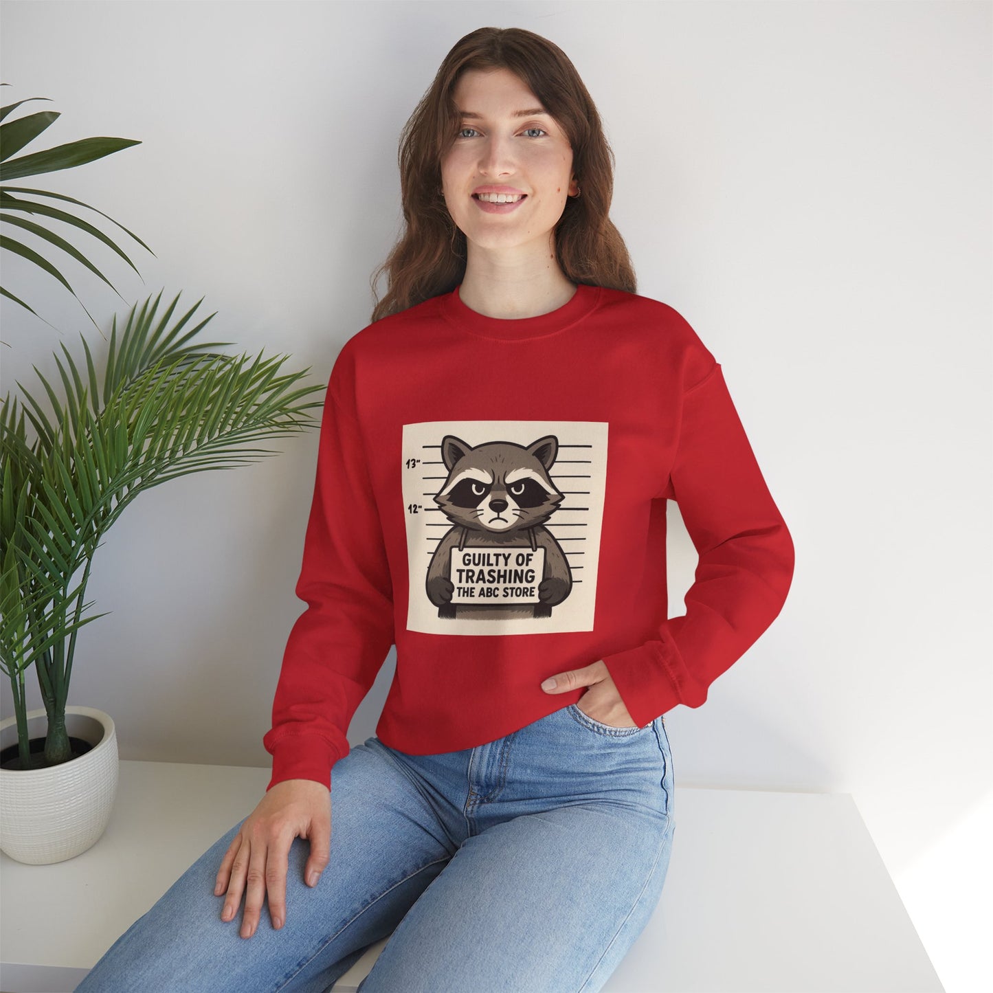 “Guilty of Trashing the ABC Store” Raccoon Unisex Heavy Blend™ Crewneck Sweatshirt