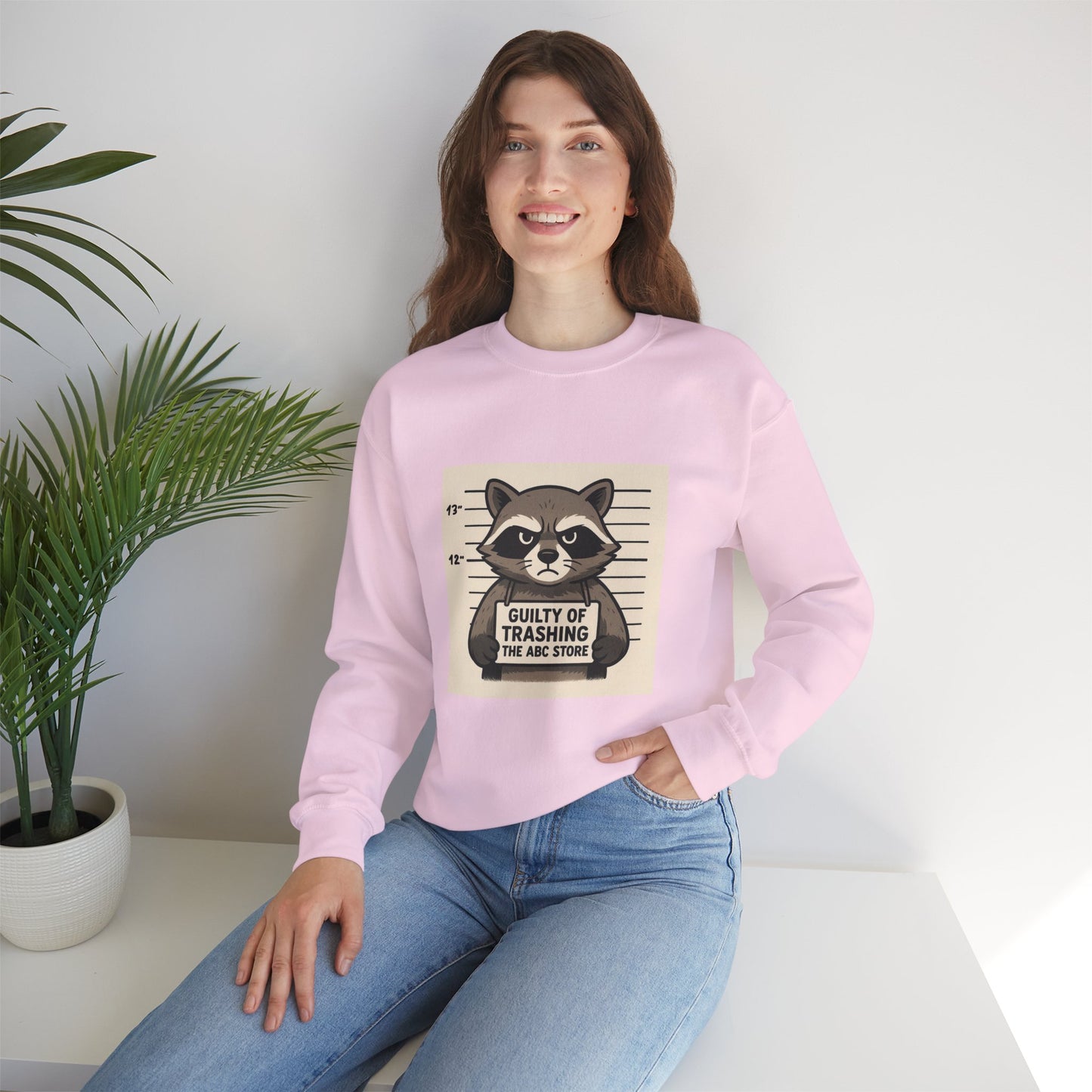 “Guilty of Trashing the ABC Store” Raccoon Unisex Heavy Blend™ Crewneck Sweatshirt