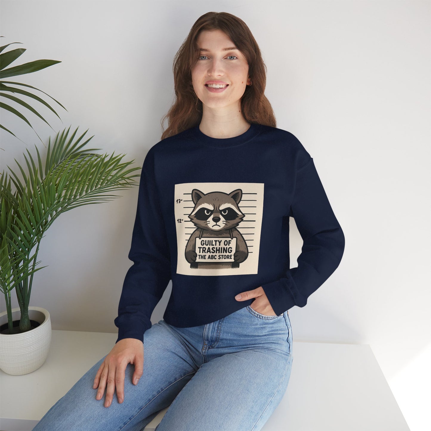 “Guilty of Trashing the ABC Store” Raccoon Unisex Heavy Blend™ Crewneck Sweatshirt