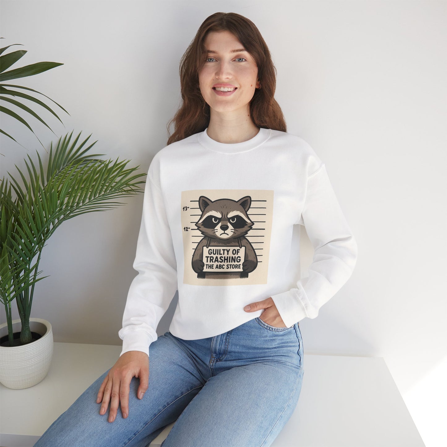 “Guilty of Trashing the ABC Store” Raccoon Unisex Heavy Blend™ Crewneck Sweatshirt
