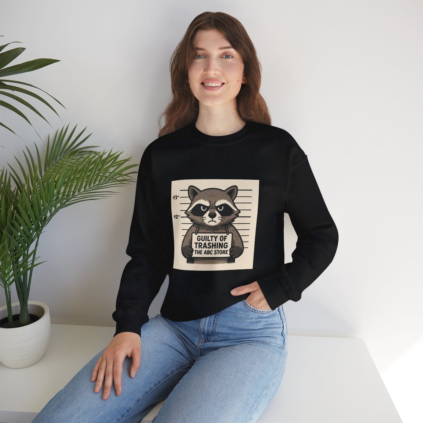 “Guilty of Trashing the ABC Store” Raccoon Unisex Heavy Blend™ Crewneck Sweatshirt