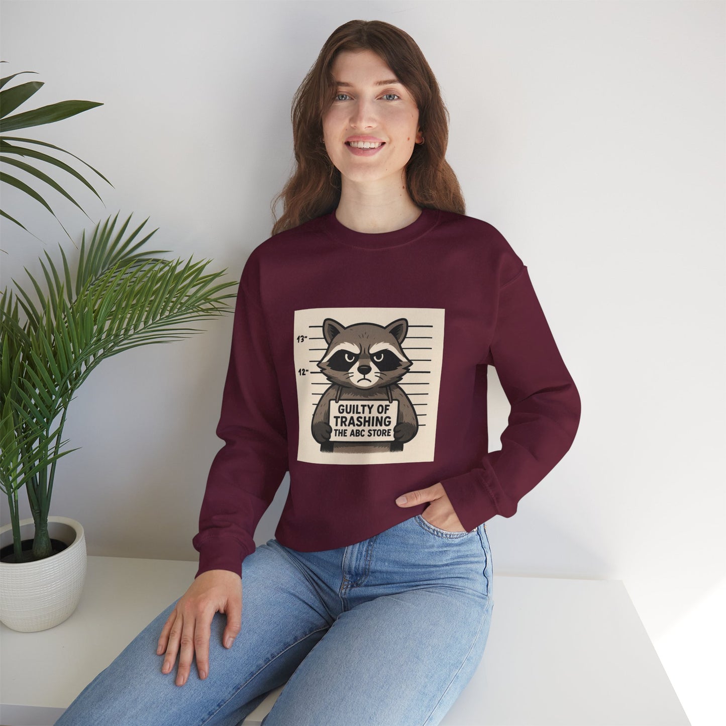 “Guilty of Trashing the ABC Store” Raccoon Unisex Heavy Blend™ Crewneck Sweatshirt