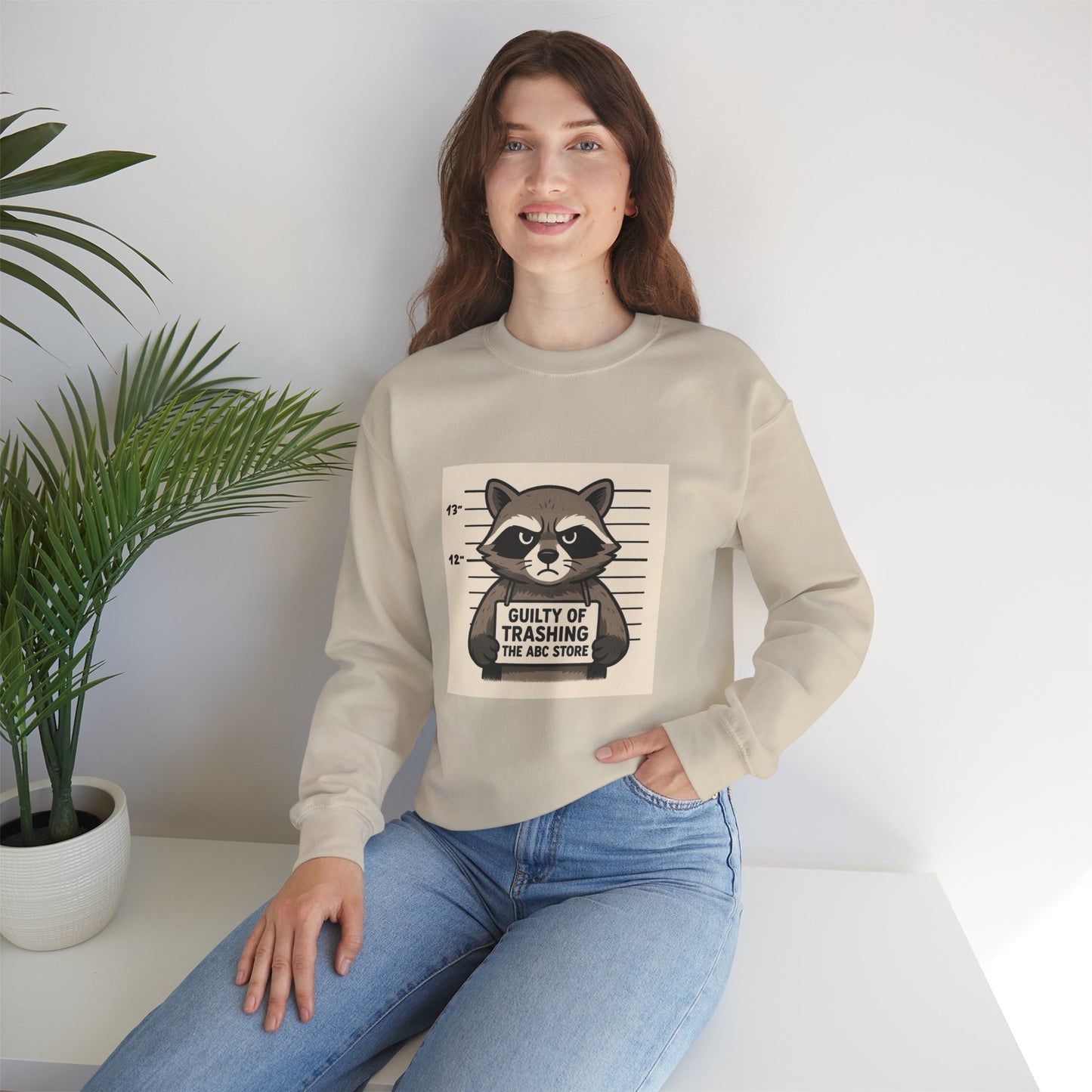 “Guilty of Trashing the ABC Store” Raccoon Unisex Heavy Blend™ Crewneck Sweatshirt